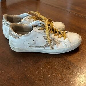 Lightly used sparkling Golden Goose 6.5 size